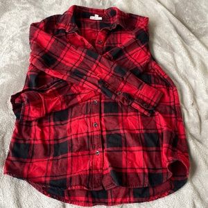 Red and black button down shirt.